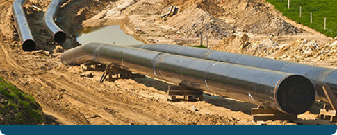 a pipeline on a construction site laid out before being buried