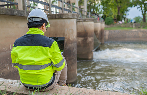 engineer monitoring a dam