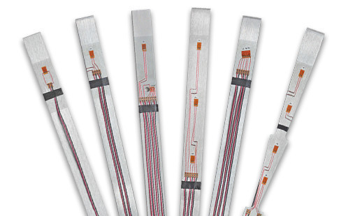 Six strain gages attached to beams for testing